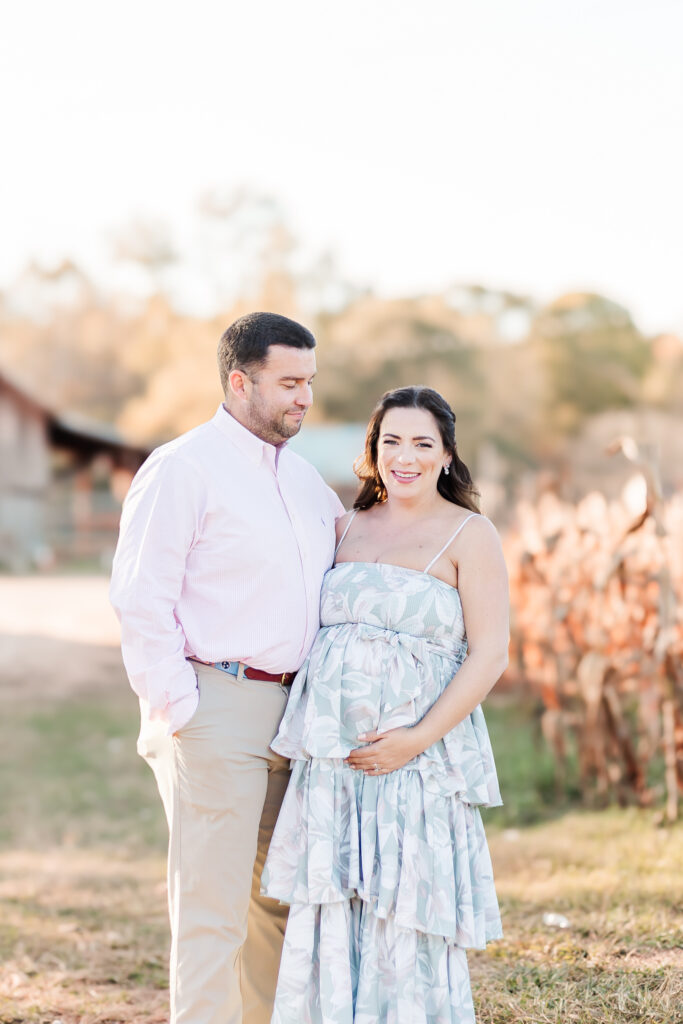 Maternity session as part of a Milestone Membership, showcasing beautiful fall scenery and intimate moments with expecting parents