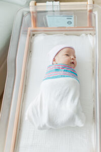 newborn baby boy swaddled in hospital swaddle at Grandview Medical center in Birmingham, AL