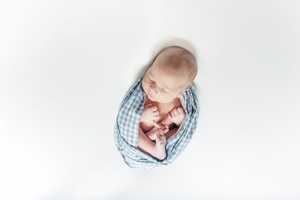 Lavender family together during their in-home newborn photography session in Birmingham