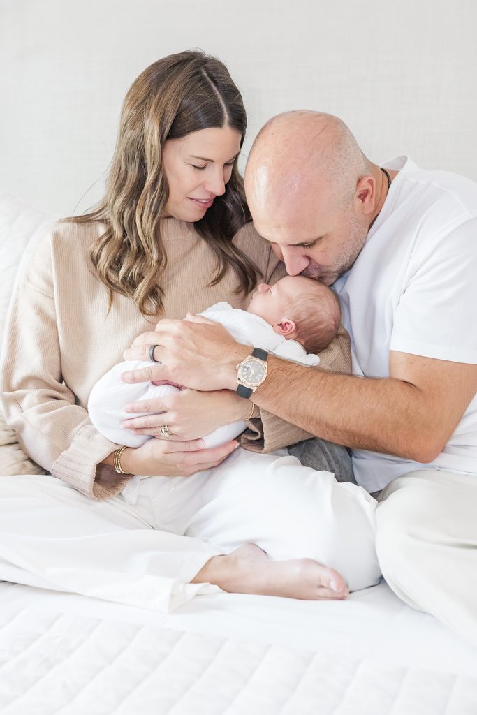 Quiet newborn moment photographed at home during the Lavender family's Birmingham session