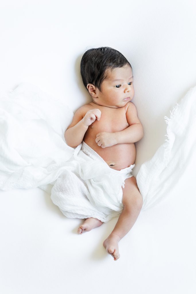 Family moment from the Gonzalez in-home newborn session in Trussville, Alabama