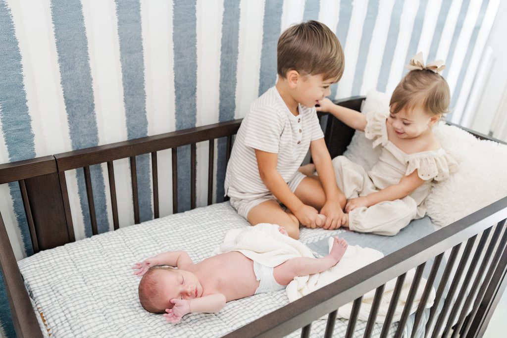 Lavender family together at home during their Birmingham newborn photography session