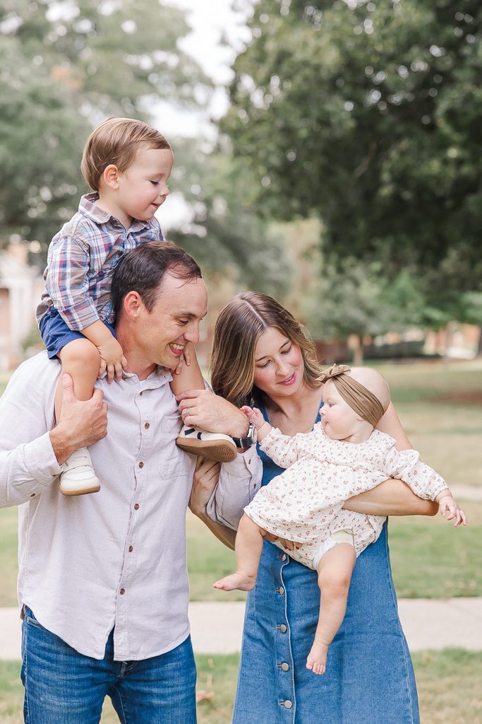 A candid moment between Harper, Liam and their parents.