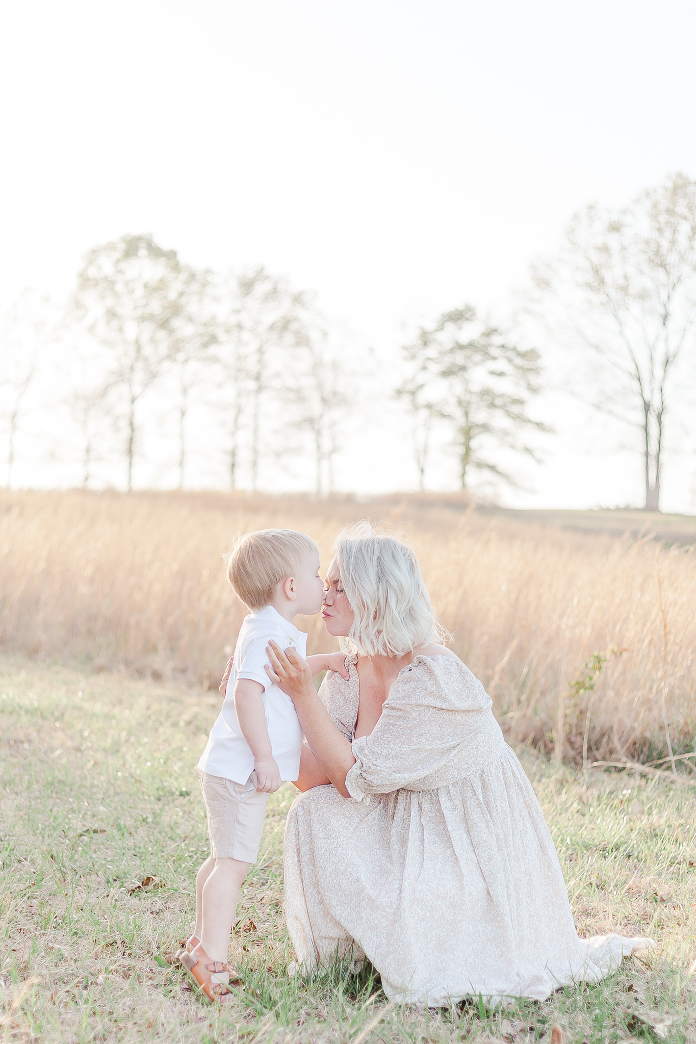 Mom and son hugging during a family photo session outside of Birmingham, AL