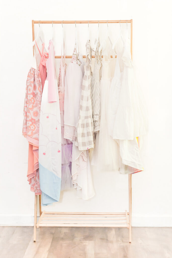 Girls dresses hanging on rack in 5U Photography studio in Birmingham Alabama

 