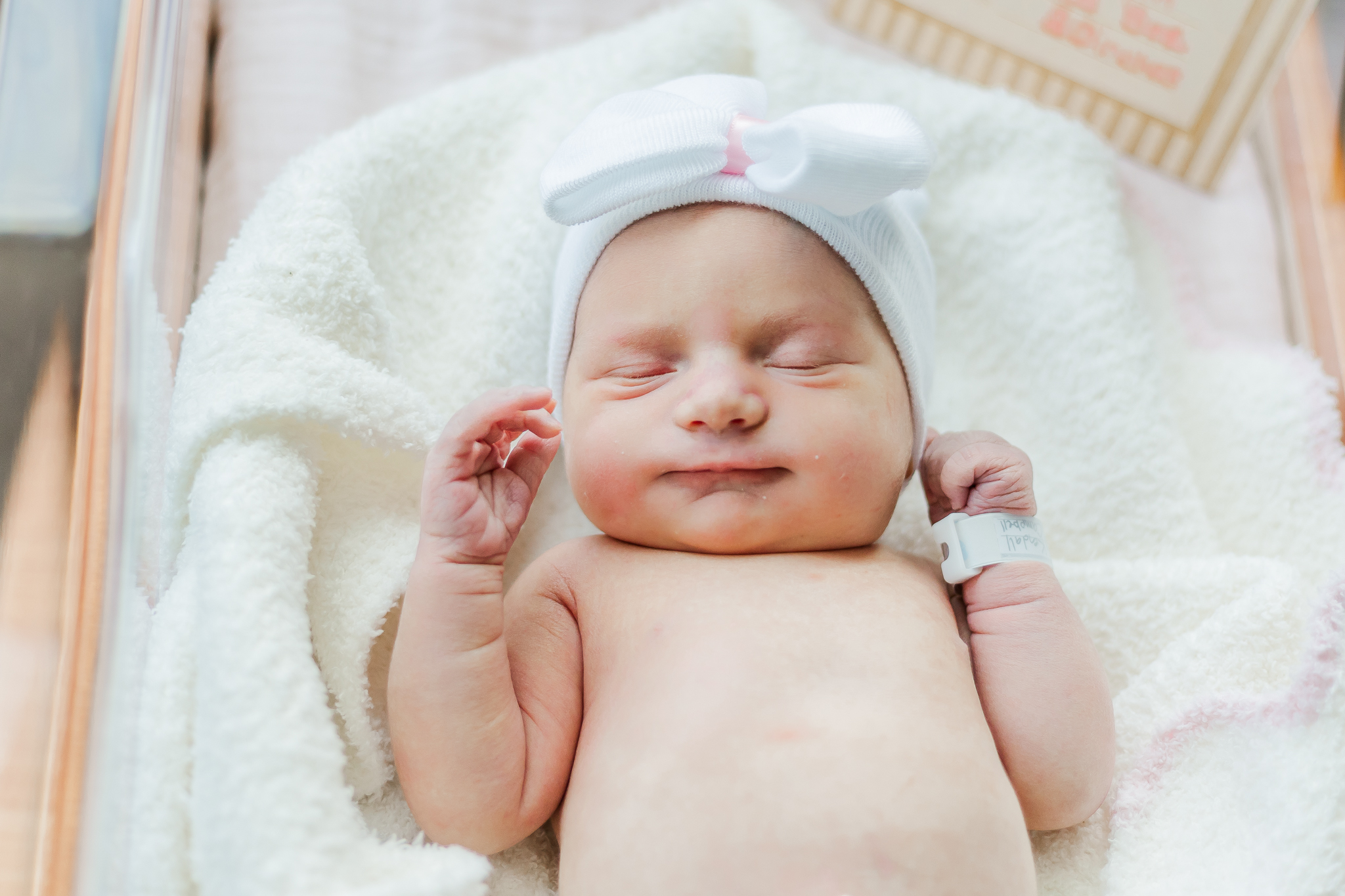 A newborn baby peacefully sleeping in a hospital crib at Grandview Medical Center, Birmingham, Alabama