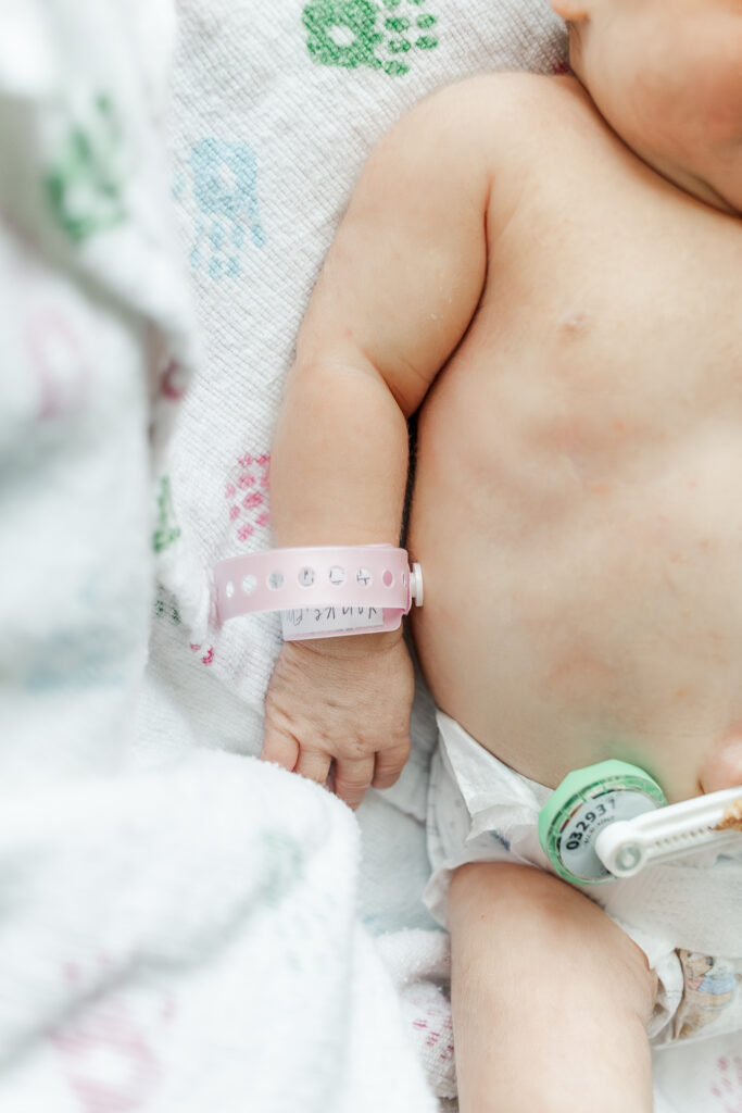 Close-up of baby Ella Jo’s tiny hand during her Fresh 48 session