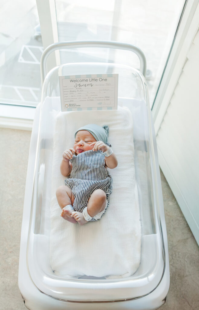 Hospital room at Brookwood Hospital with soft natural light, creating a serene backdrop for baby Ezra’s Fresh 48 session