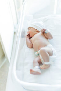 newborn baby boy lying in hospital bassinet during Birmingham AL fresh 48 session at Brookwood Hospital