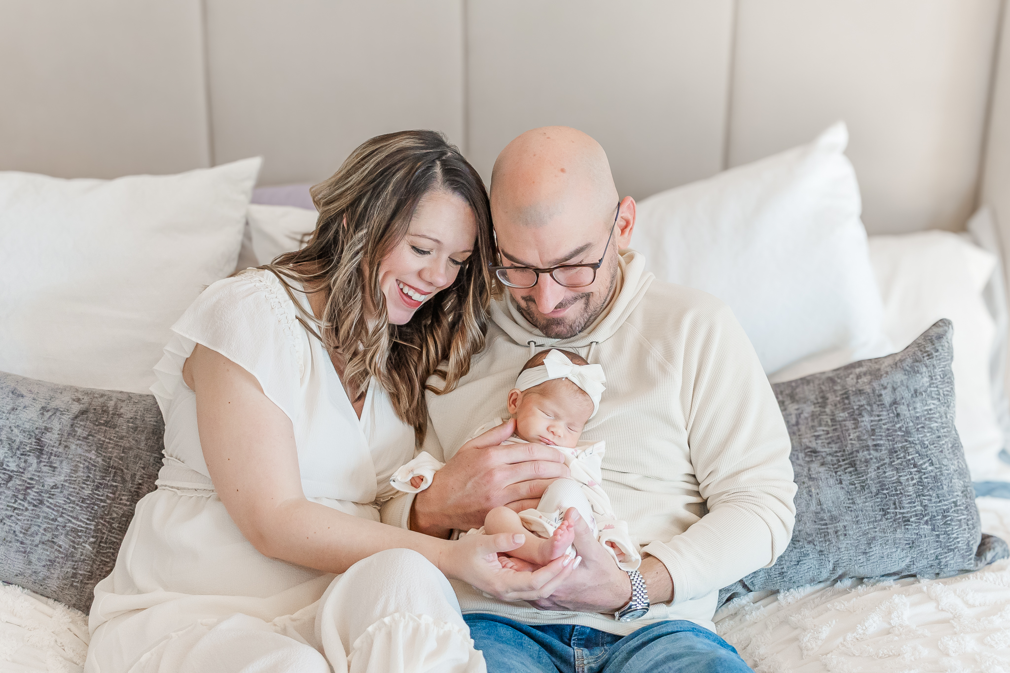 The Yonke parents lovingly holding their newborn baby girl, Ella Jo